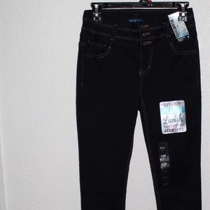 Blue spice triple stack skinny jeans